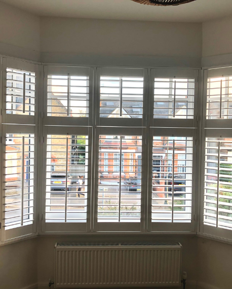 Plantation shutters bay window